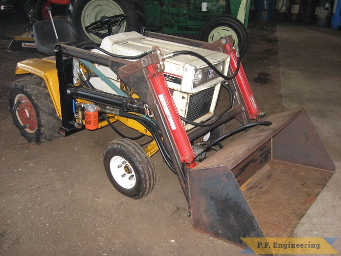David O. in Sparta, WI fabricated this loader for his wide frame cub cadet garden tractor | Cub Cadet model 149 garden tractor loader_1