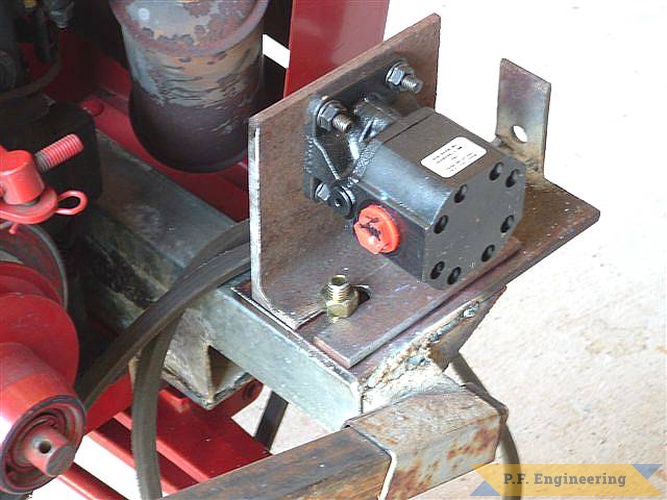 pics of the side engine Pump mounting design | Wheel Horse 16 HP garden tractor Loader_2
