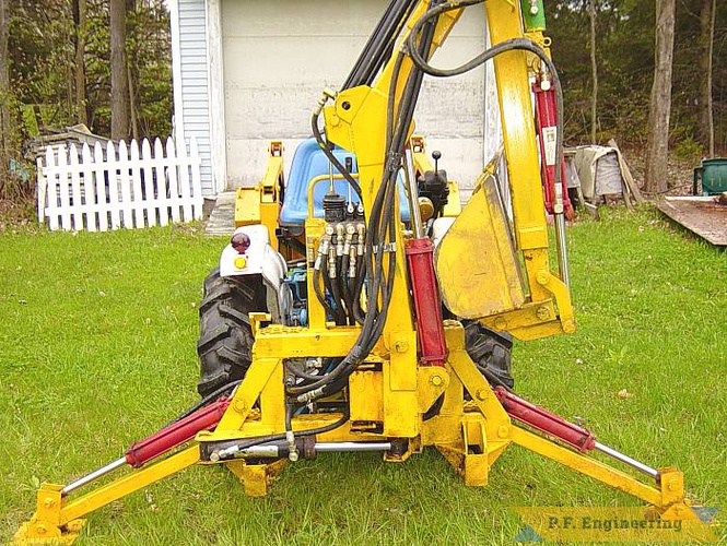 here is the 170 degree boom rotation demonstrated and 3 point hitch mounting. | Ford 1110 compact tractor Micro Hoe_2
