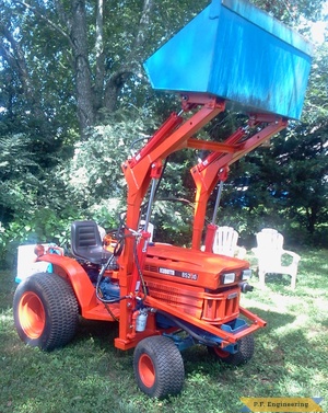 Kubota B5200 compact tractor loader raised bucket