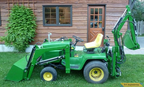 John Deere 318 Micro Hoe Loader left side view by Walter K., Pointe Claire, Quebec, CN