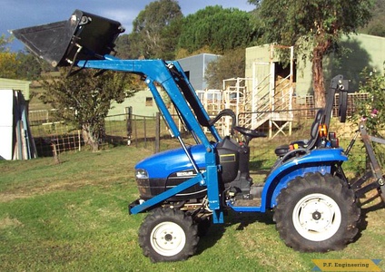 New Holland TC 23D compact tractor loader_1